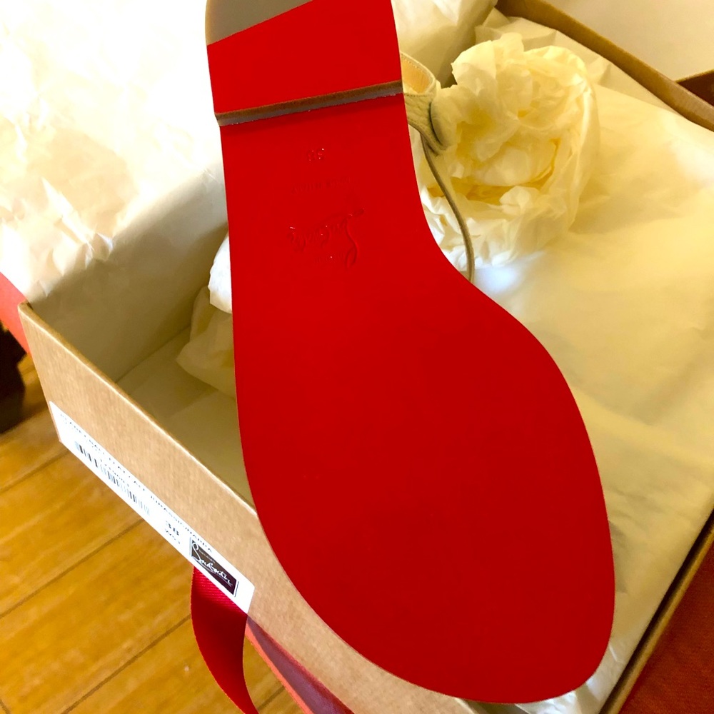 Christian Louboutin off white Planet ball flat sandal. Brand new! Never worn.